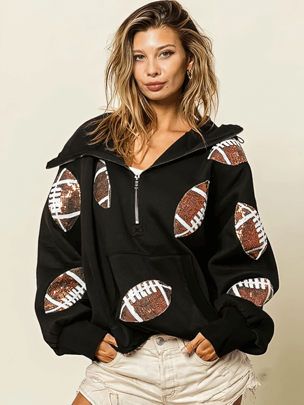 Sporty casual women's black hoodie with football sequin designs, front zipper, and pockets - perfect for a stylish sporty look.